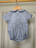 Load image into Gallery viewer, Blue checkered baby romper on a hanger against a plain background